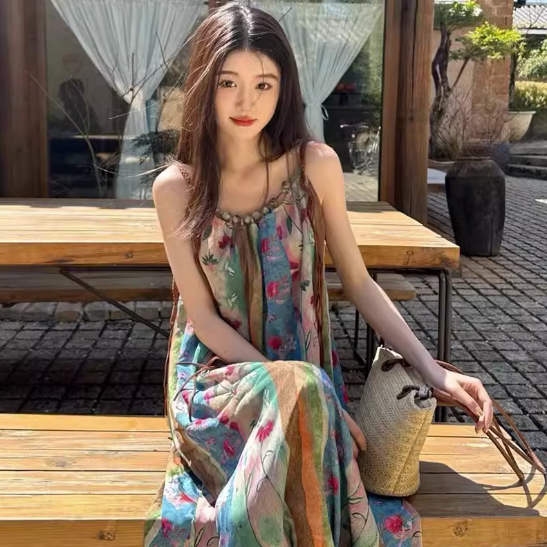 海邊度假吊帶連衣裙子女 2024 年夏季新款法式 復古碎花氣質沙灘長裙 限時特價¥64.7