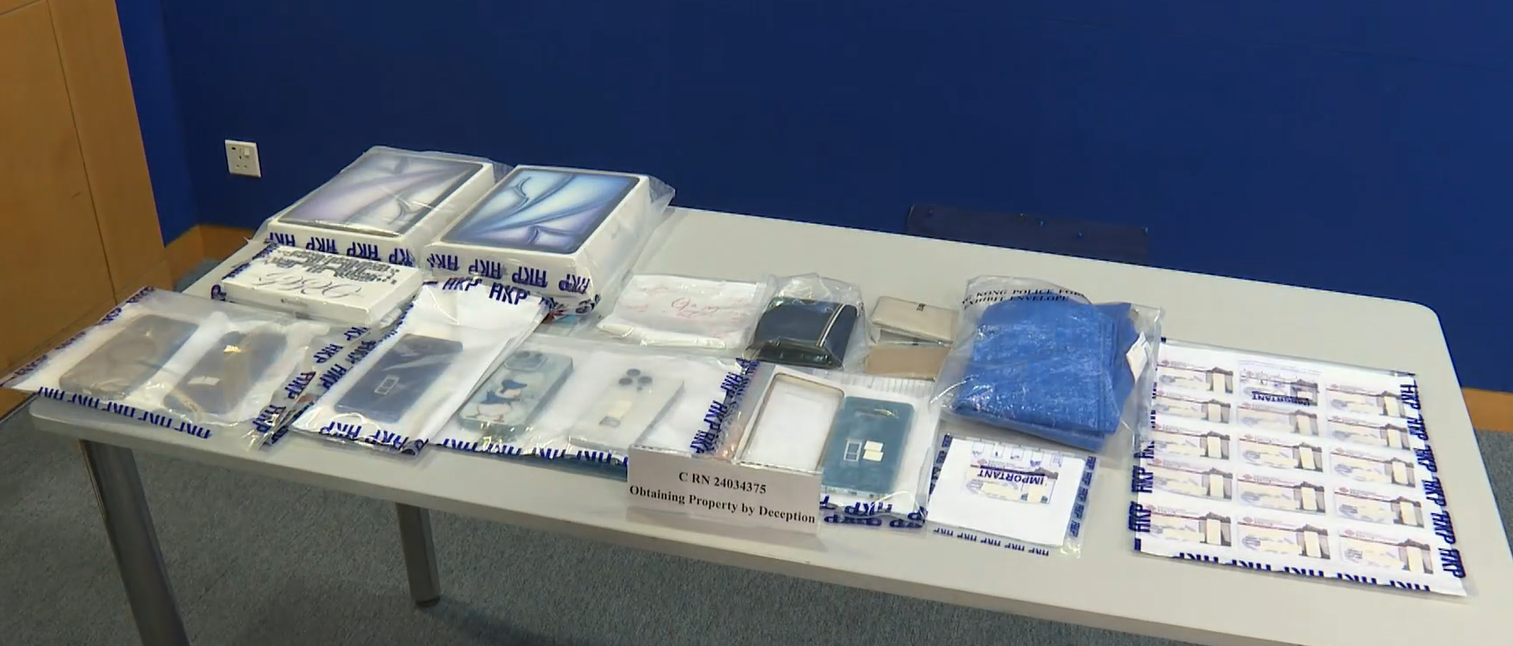 三人懷疑使用虛假學生證,獲得該電子產品商店提供的教育優惠購買電子產品,再以較高價錢出售圖利。(有線新聞畫面)