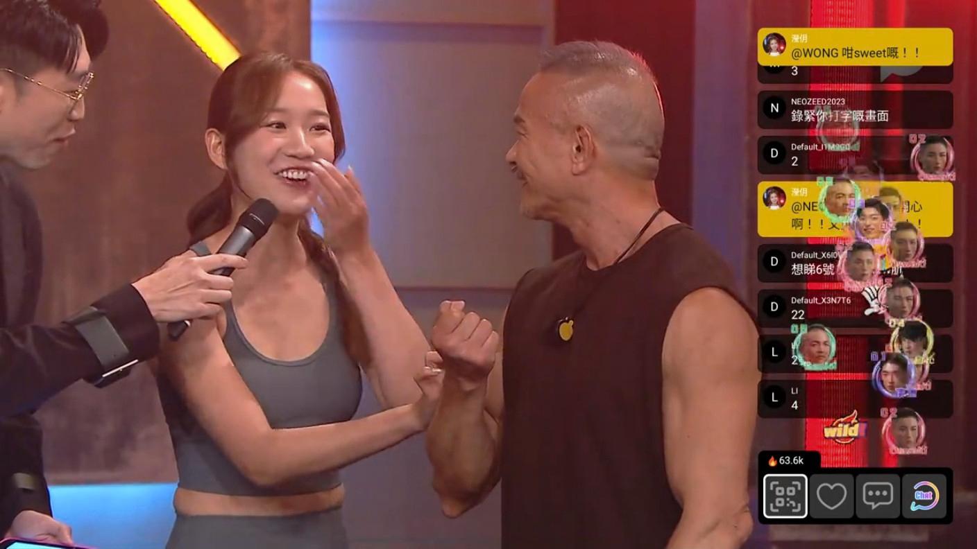 Michelle想感受5號Daniel的臂肌。