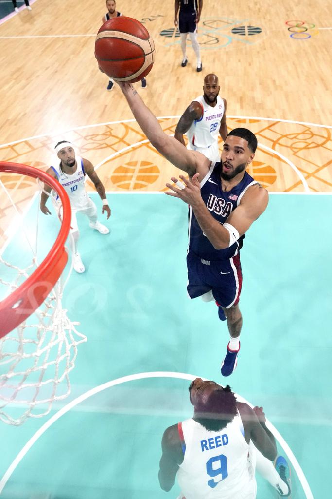 憑著愛華士攻入全場最高的26分,美國男籃以104:83大勝波多黎各。(美聯社)