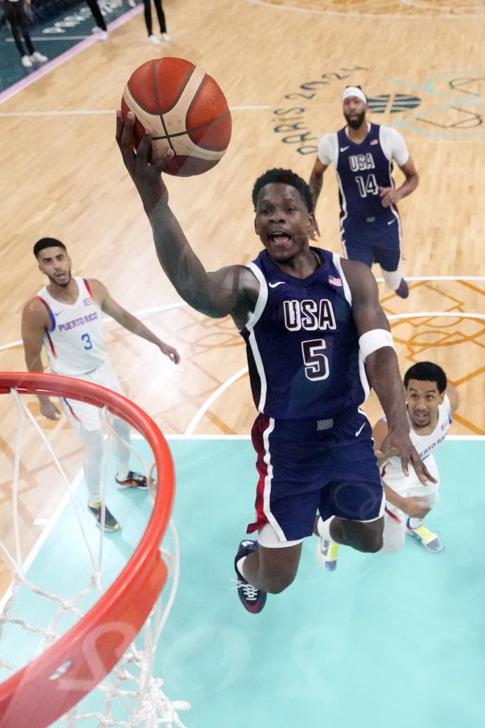 憑著愛華士攻入全場最高的26分,美國男籃以104:83大勝波多黎各。(美聯社)