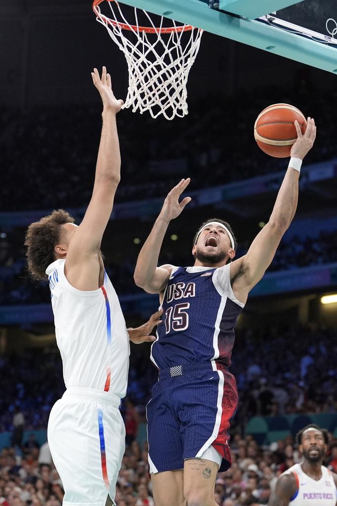 憑著愛華士攻入全場最高的26分,美國男籃以104:83大勝波多黎各。(美聯社)