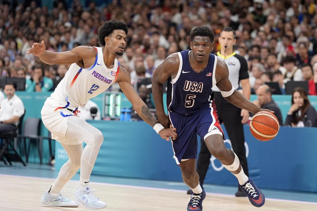 憑著愛華士攻入全場最高的26分,美國男籃以104:83大勝波多黎各。(美聯社)