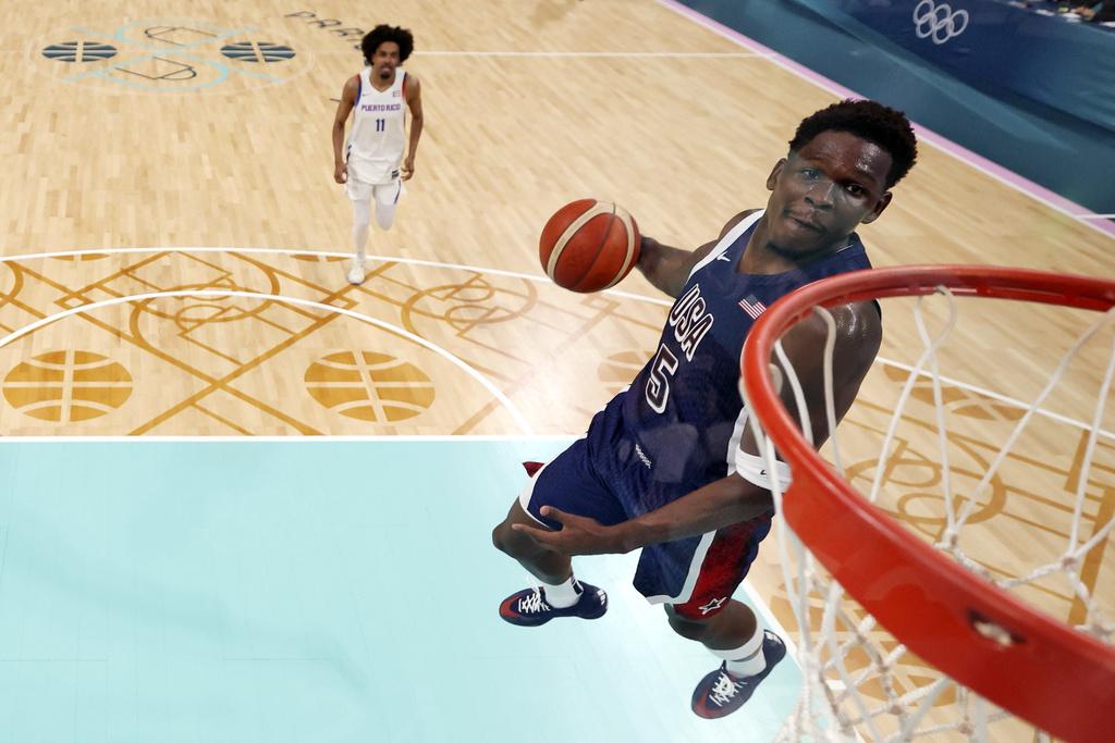 憑著愛華士攻入全場最高的26分,美國男籃以104:83大勝波多黎各。(美聯社)