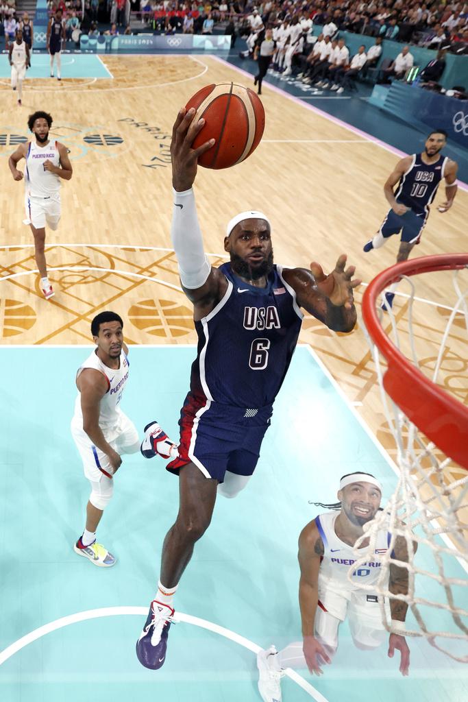 憑著愛華士攻入全場最高的26分,美國男籃以104:83大勝波多黎各。(美聯社)