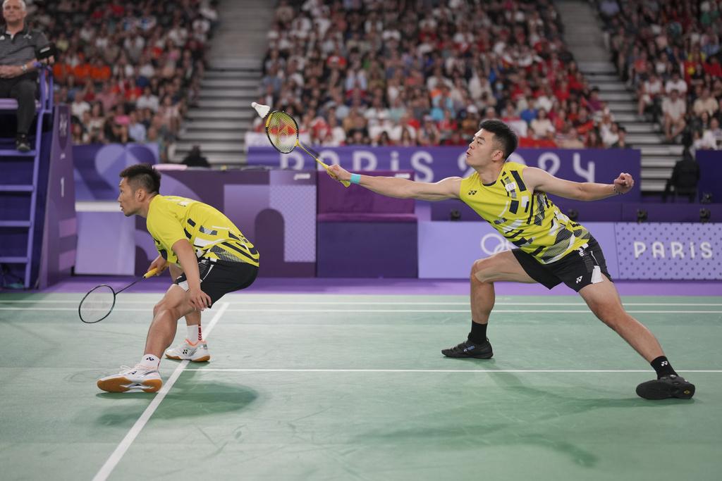 中華台北羽毛球男雙擊敗中國隊,成功衛冕。(美聯社)