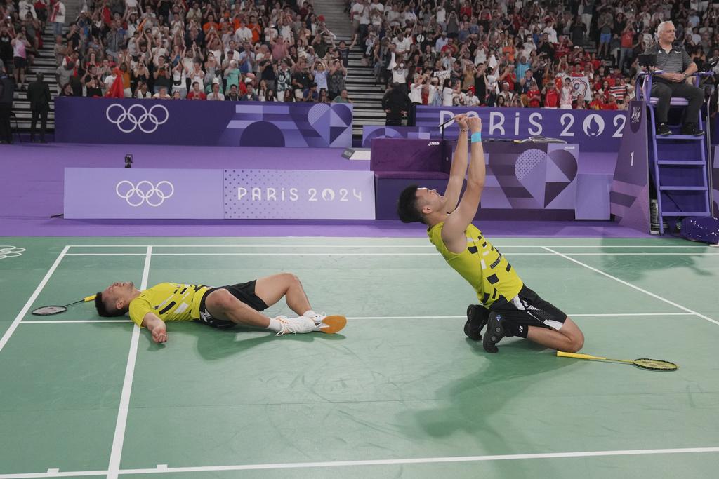 中華台北羽毛球男雙擊敗中國隊,成功衛冕。(美聯社)