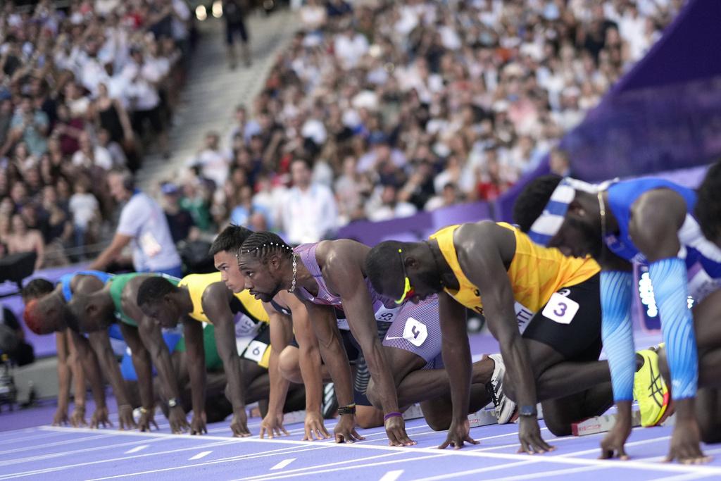 利里斯於決賽跑出9.79秒,力壓牙買加的湯臣摘金。(美聯社)