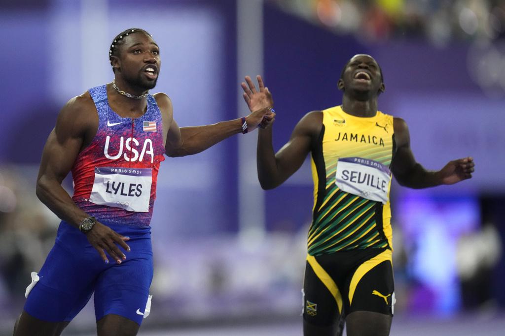 利里斯於決賽跑出9.79秒,力壓牙買加的湯臣摘金。(美聯社)