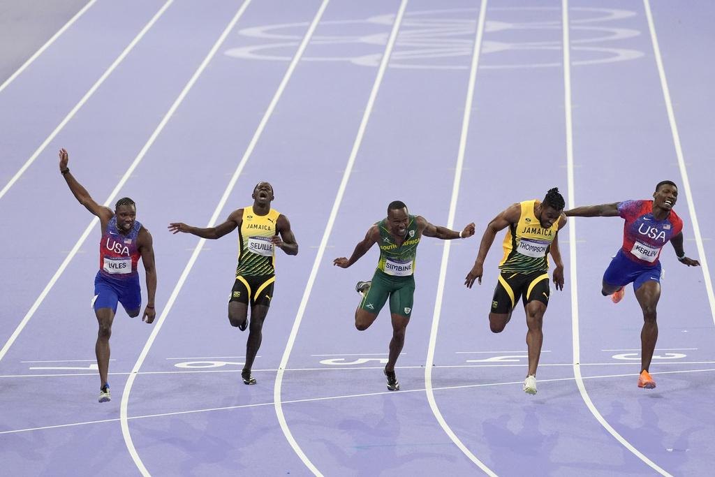 利里斯於決賽跑出9.79秒,力壓牙買加的湯臣摘金。(美聯社)