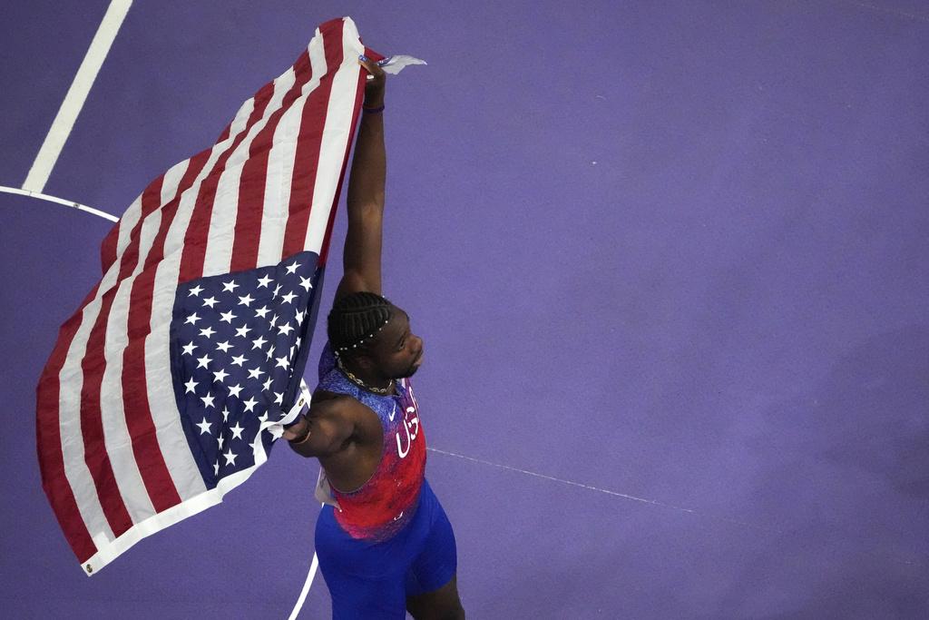 利里斯於決賽跑出9.79秒,力壓牙買加的湯臣摘金。(美聯社)