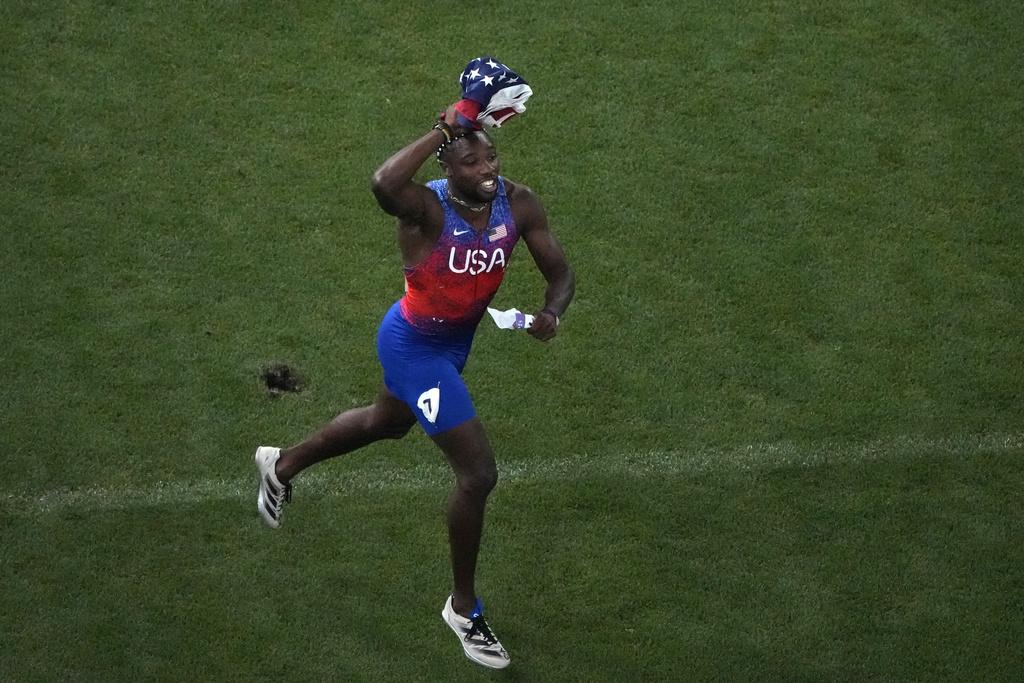 利里斯於決賽跑出9.79秒,力壓牙買加的湯臣摘金。(美聯社)