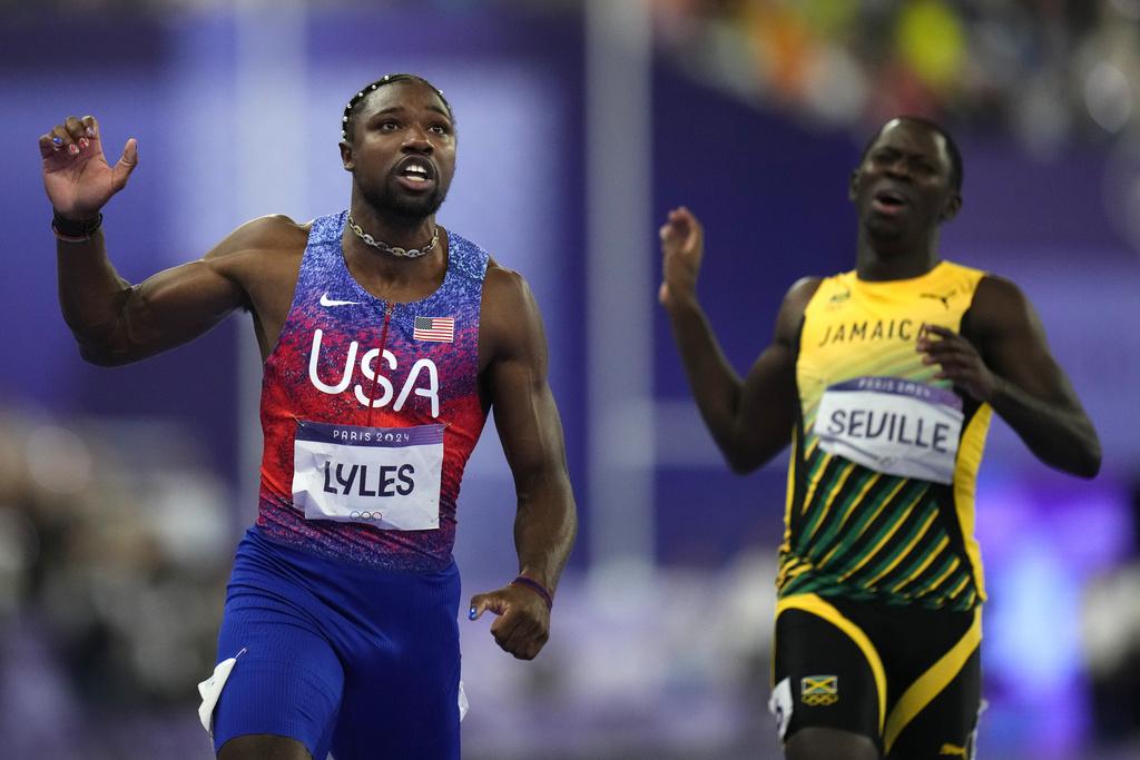 利里斯於決賽跑出9.79秒,力壓牙買加的湯臣摘金。(美聯社)