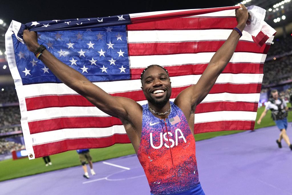 利里斯於決賽跑出9.79秒,力壓牙買加的湯臣摘金。(美聯社)