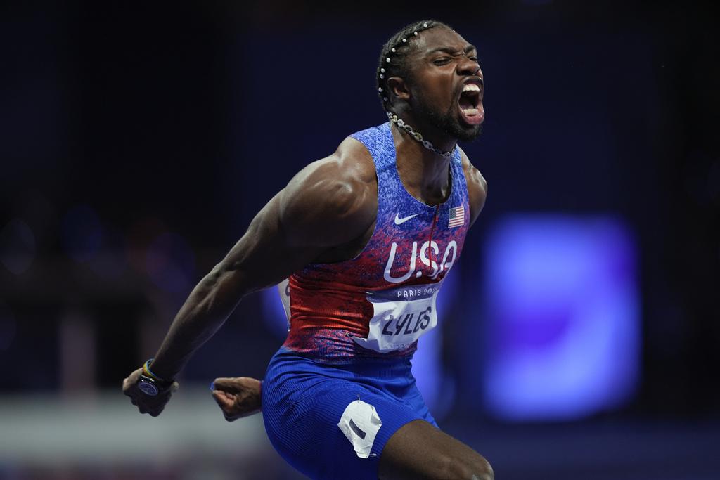 利里斯於決賽跑出9.79秒,力壓牙買加的湯臣摘金。(美聯社)