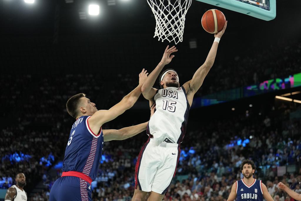 塞爾維亞頭三節可謂打出完美表現,可惜面對的是實力恐怖的美國男籃。(美聯社)