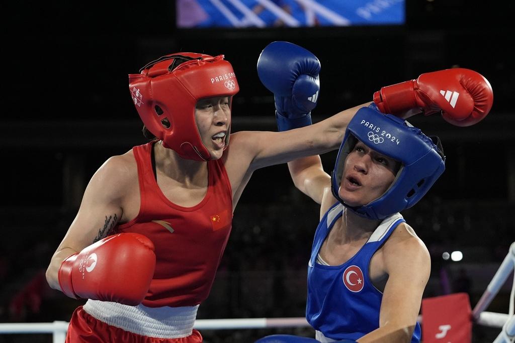 吳愉在女子50公斤級決賽中取得中國在本屆奧運女子拳擊第2面金牌。(美聯社)