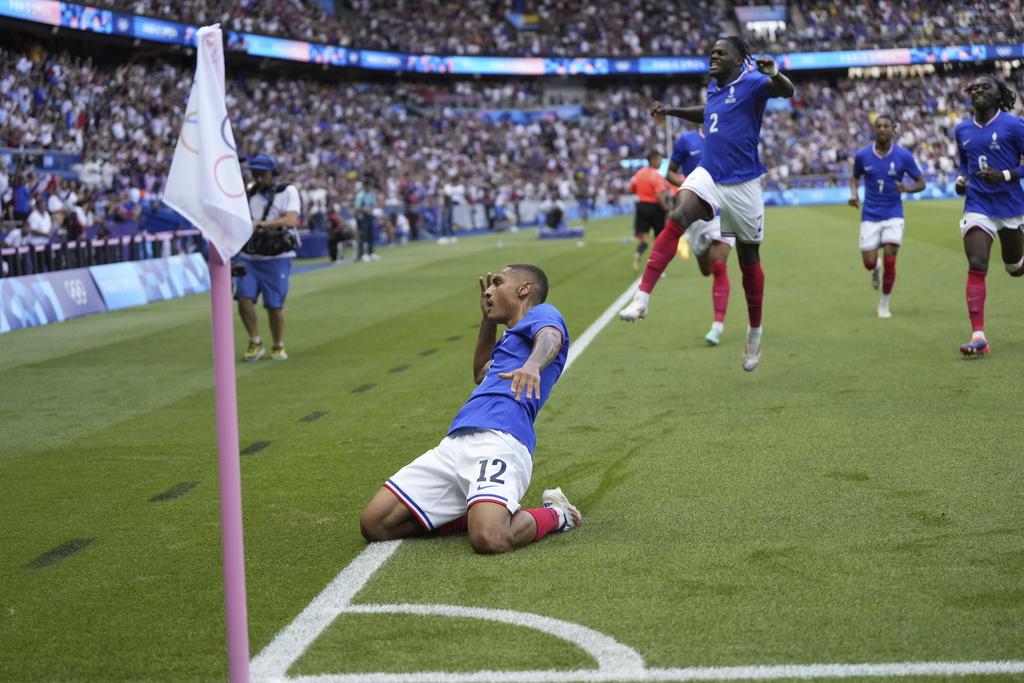 兩隊開賽鬥得激烈,米洛特與費明盧比斯早段的入球令兩軍打成1:1平手。(美聯社)