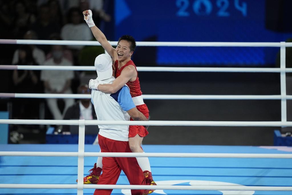 吳愉在女子50公斤級決賽中取得中國在本屆奧運女子拳擊第2面金牌。(美聯社)