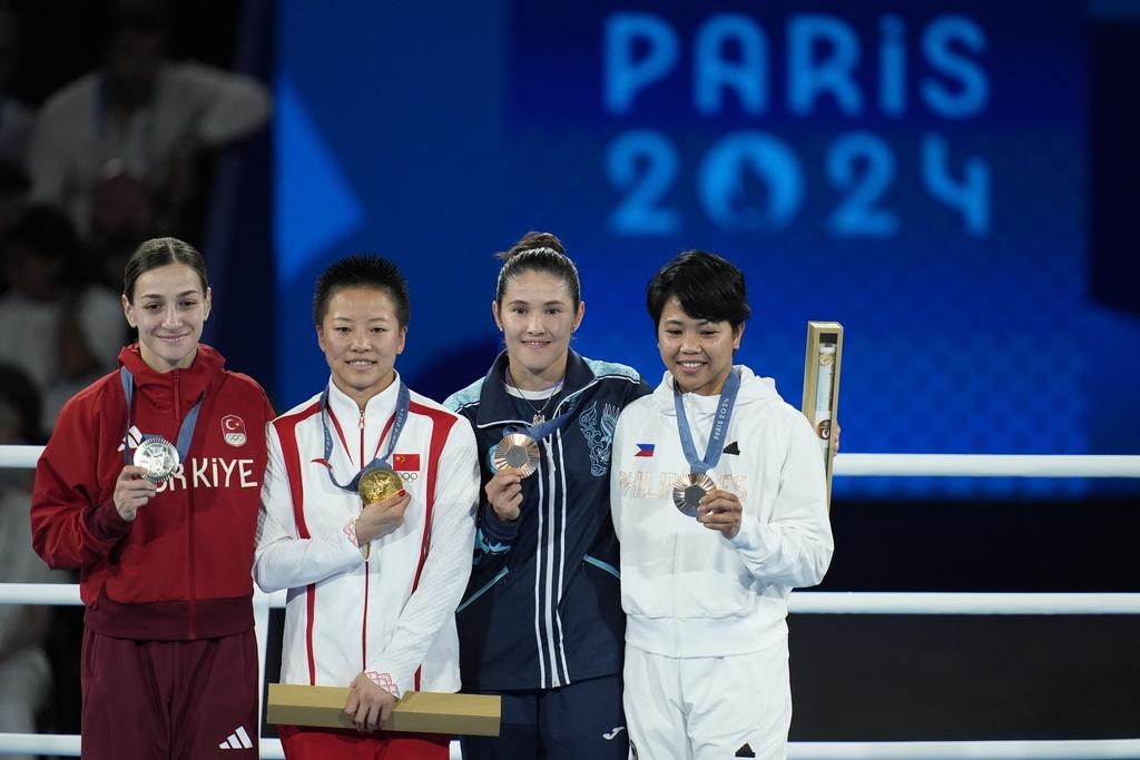 吳愉在女子50公斤級決賽中取得中國在本屆奧運女子拳擊第2面金牌。(美聯社)