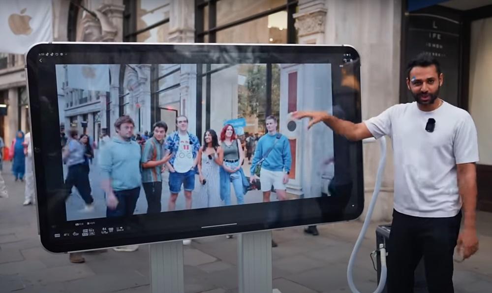 街頭測試,證明它可以進行電子支付、拍照、收發電子郵件、玩小遊戲和視像通話。(YouTube)