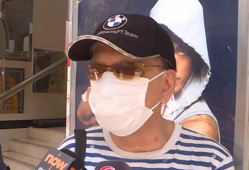 市民張先生未等「HEALTHY」開門就在大廈外排隊。(有線新聞截圖)