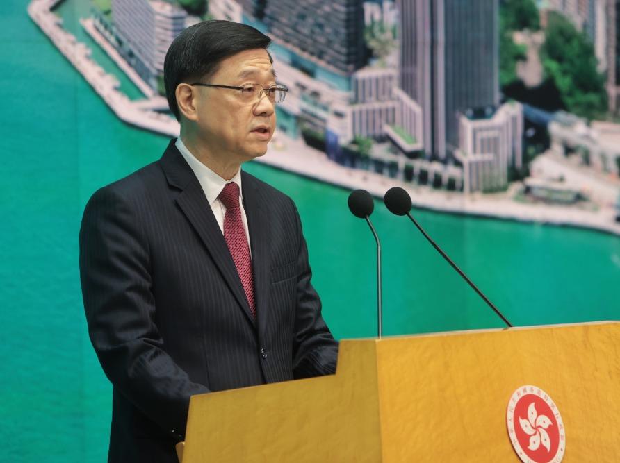 李家超指啟德體育園開幕時,會有多場演練。(中通社)