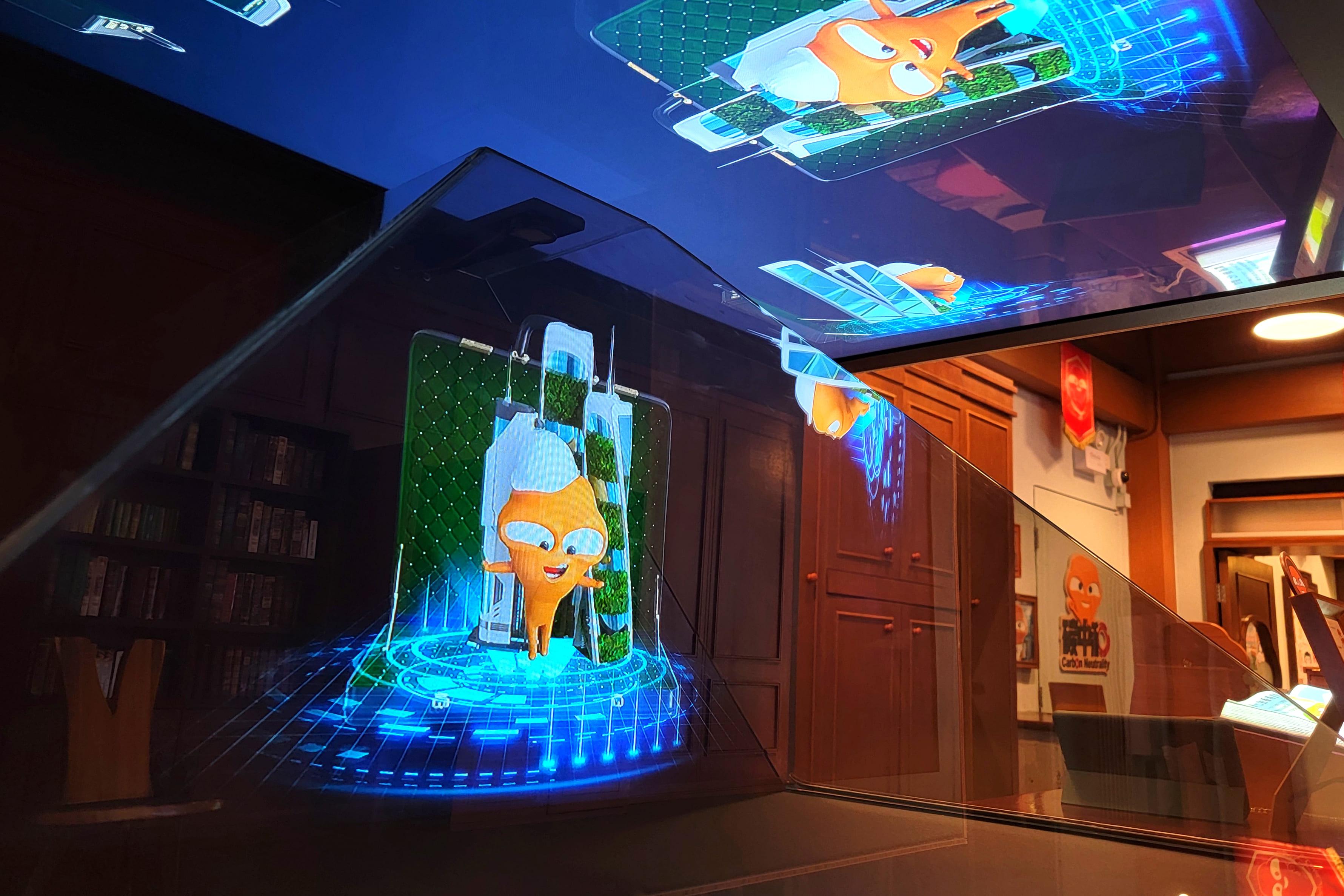 利用全息投影技術呈現減碳短劇,簡介四大減碳策略。