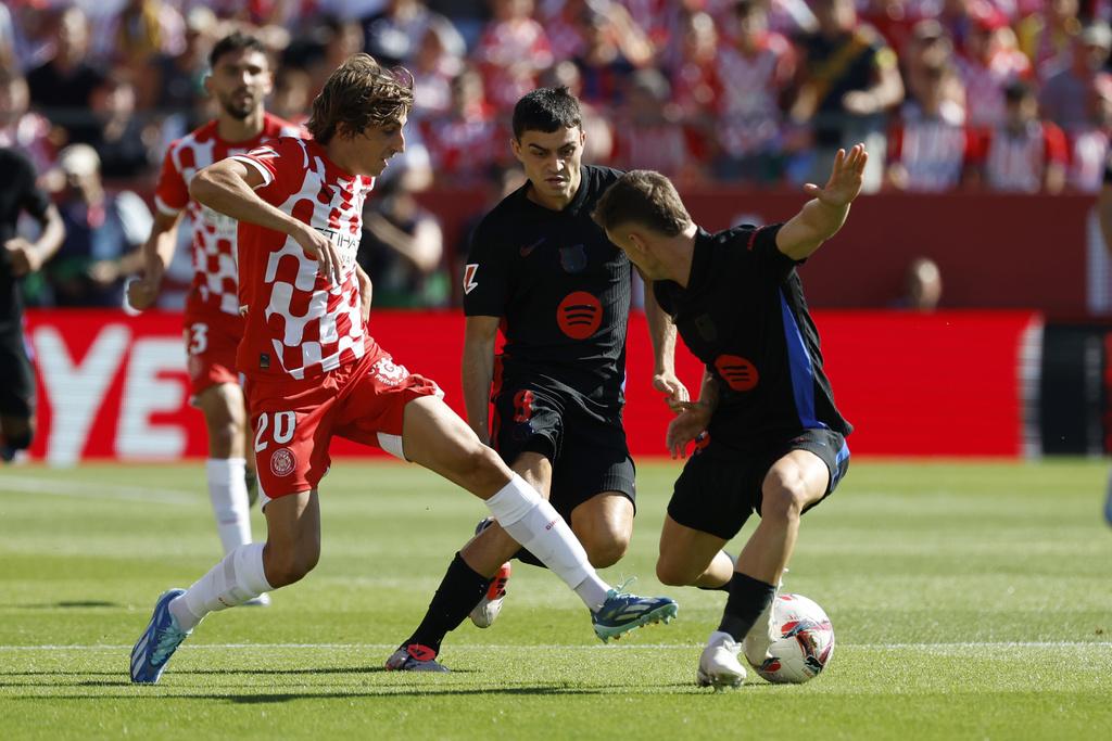 巴塞隆拿作客大勝基羅納4:1。(美聯社)