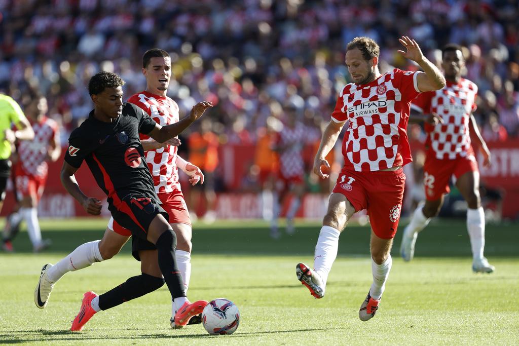 巴塞隆拿作客大勝基羅納4:1。(美聯社)