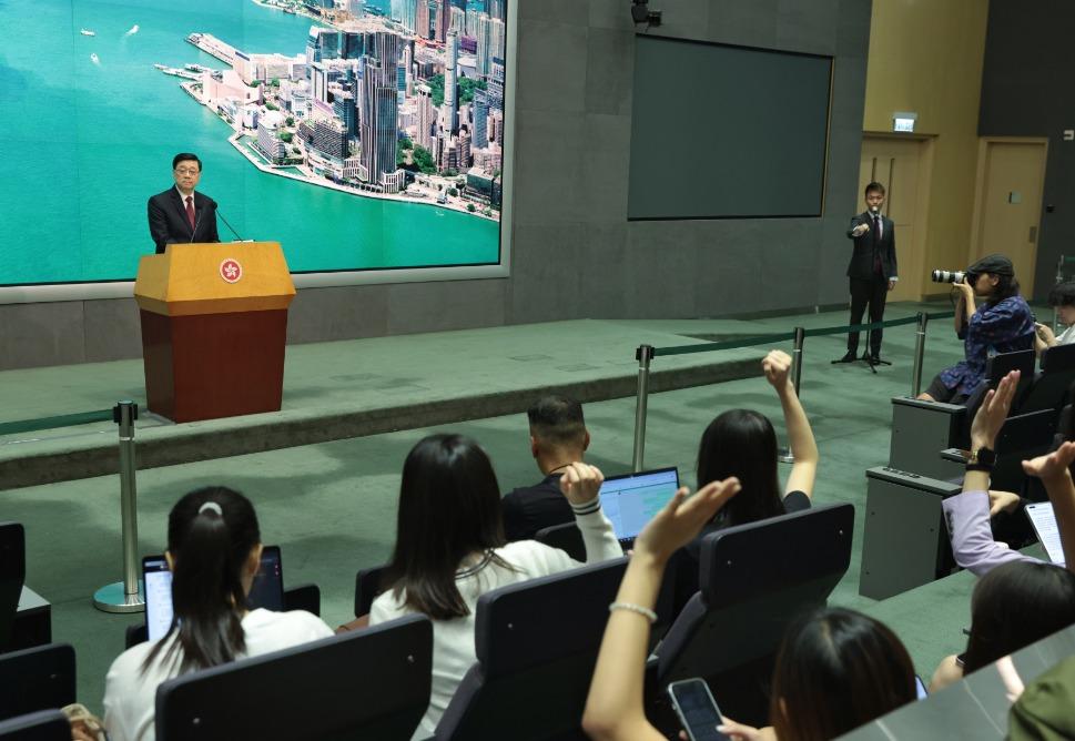 李家超指啟德體育園開幕時,會有多場演練。(中通社)