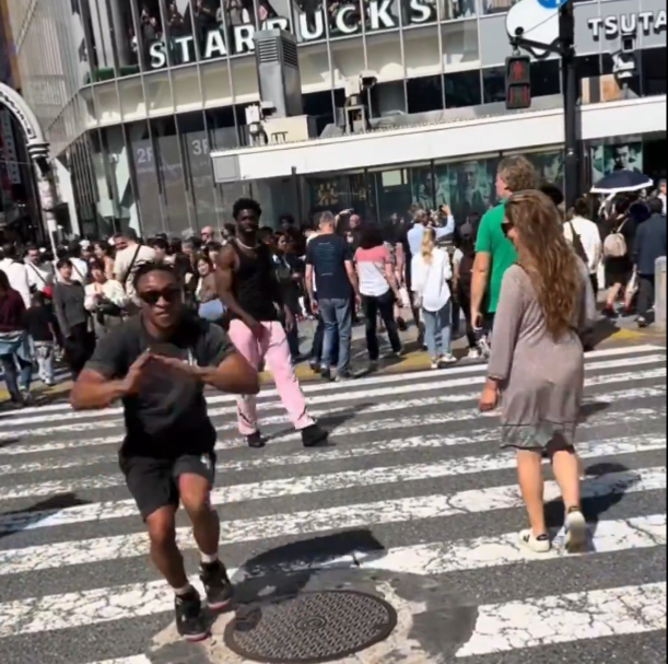 有關的街舞團體無視紅燈在跳舞拍片。(影片截圖)