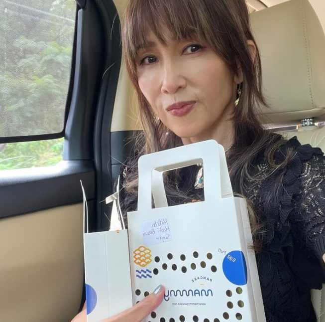 靜香臨走前再食雞蛋仔。