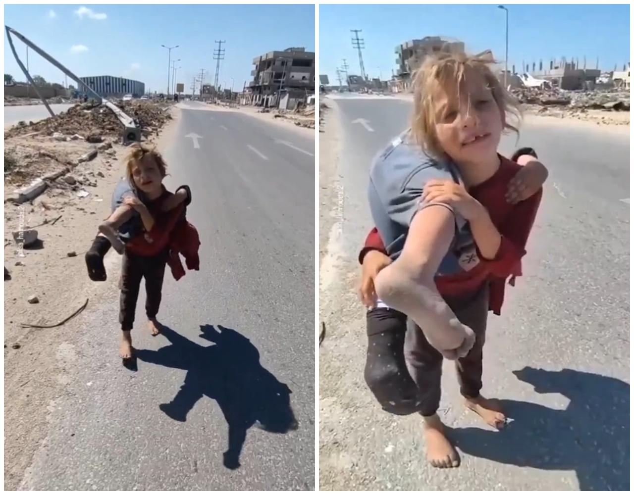 以巴衝突,加沙女孩抬著受傷妹妹,赤腳走路2公里求醫。(X)