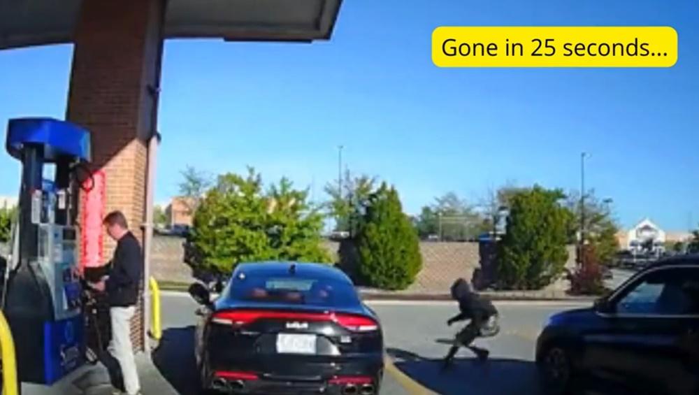 一個用帽子遮樣的小偷落車,靈活而迅速地登上寶馬。(X)