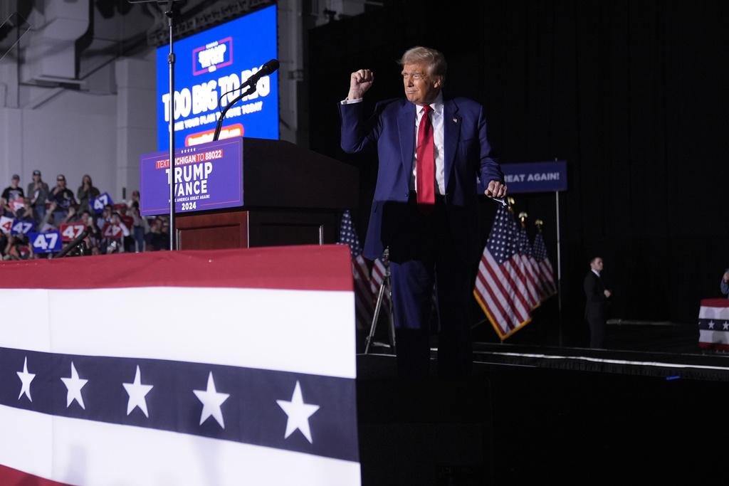 特朗普周六也在密歇根州舉行造勢大會。(美聯社)