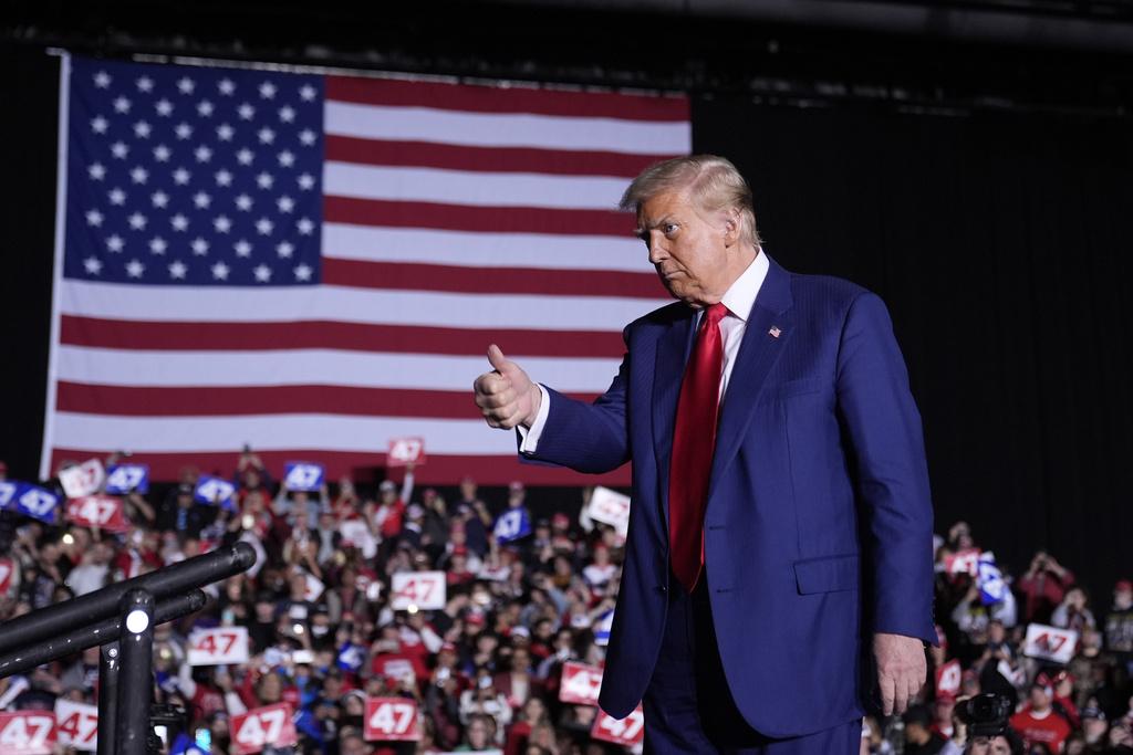 特朗普周六也在密歇根州舉行造勢大會。(美聯社)