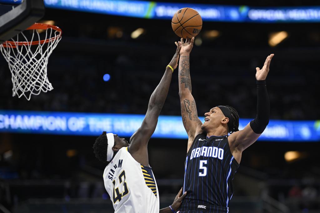 魔術以119:115擊敗溜馬。(美聯社)