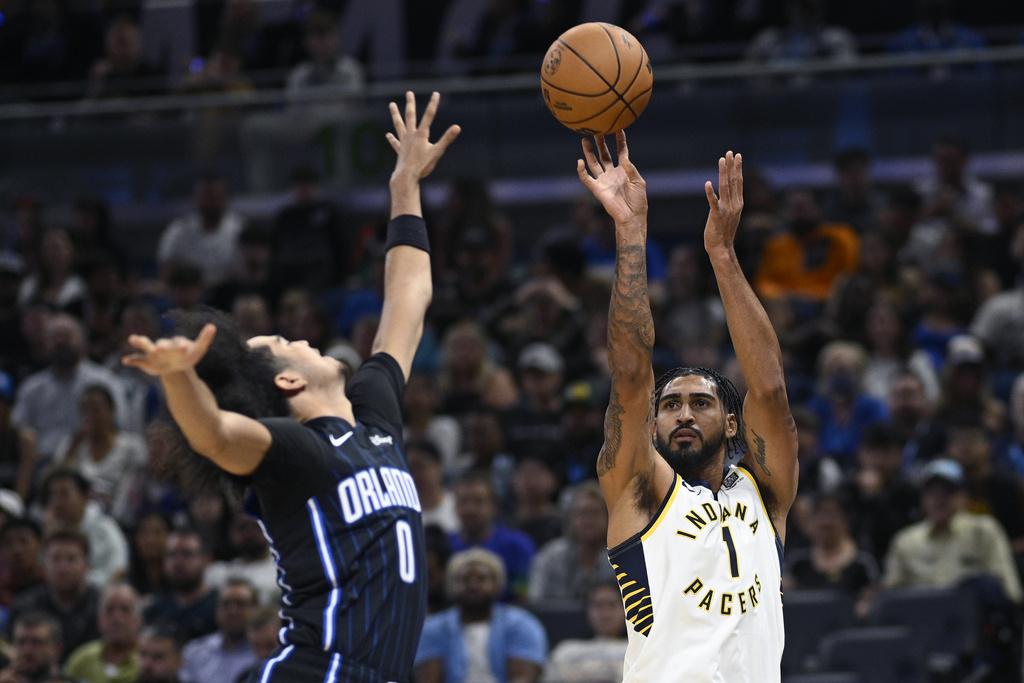 魔術以119:115擊敗溜馬。(美聯社)