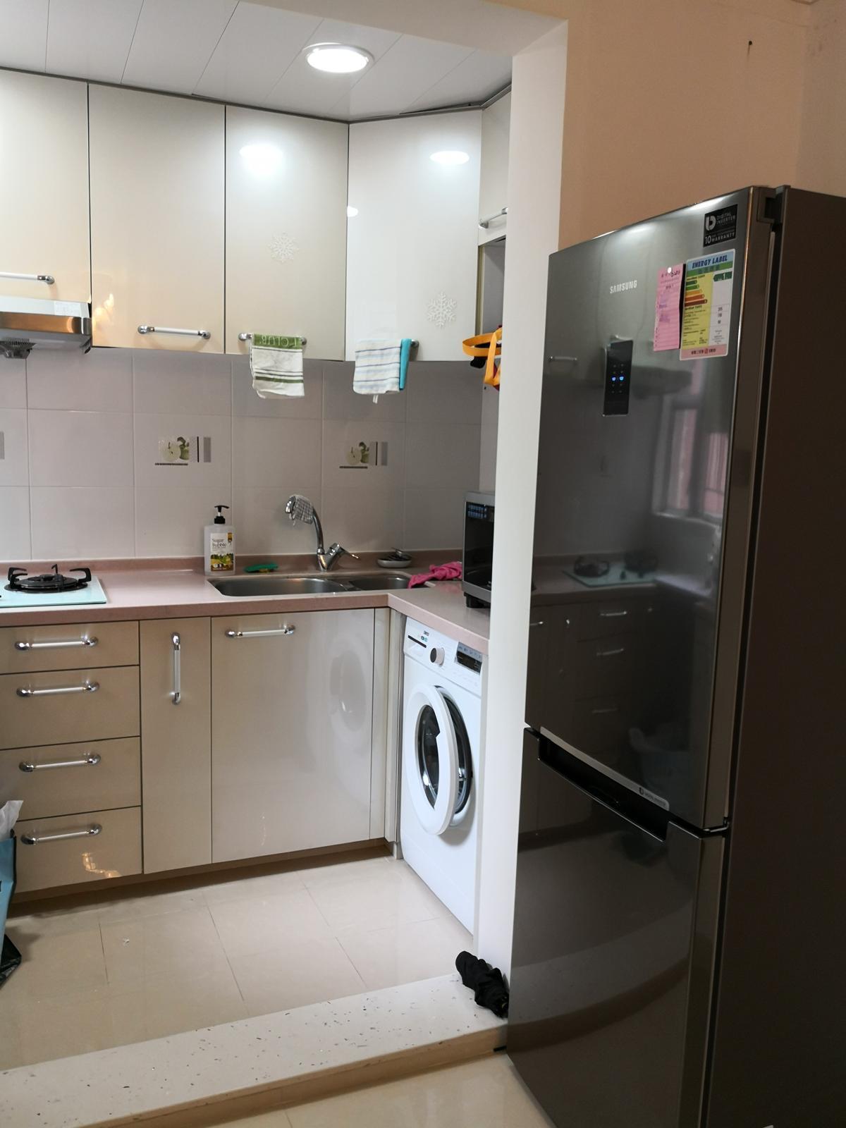 廚房採半開放式設計,令空間更見實用。(代理提供)