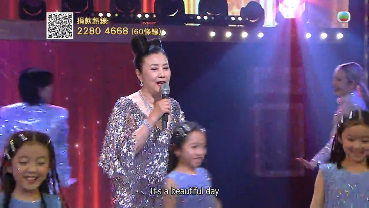 汪明荃首次演唱新歌《Make my day》表現精靈。