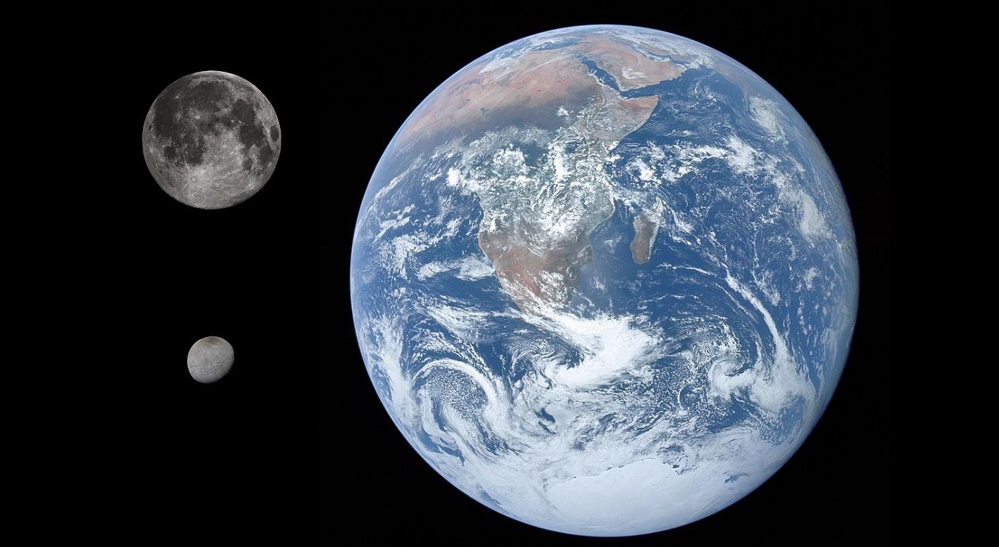 冥衛一與地球和月球的大小比較。(互聯網)