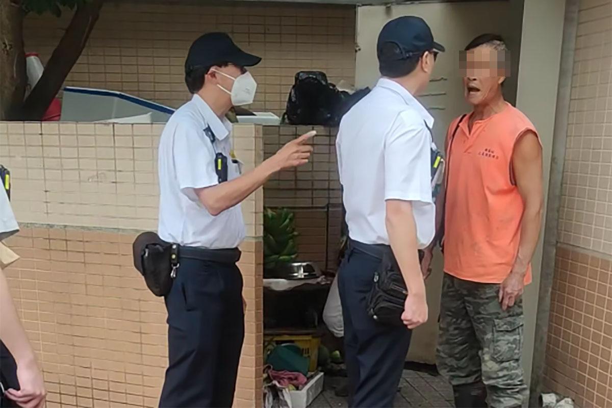男子持續與食環署人員爭吵。(網民Desmond Wang@FB群組「皇后山乜都友」)