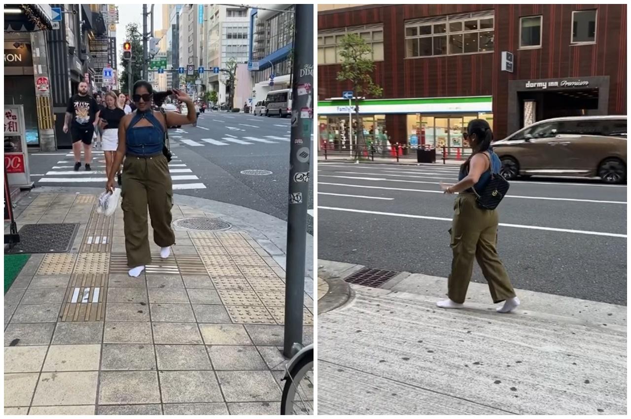 Jain只穿著襪在斑馬線和人行道上行走。(IG)