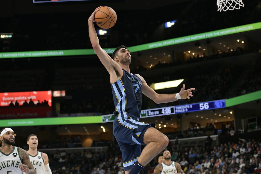 灰熊主場122:99擊敗公鹿。(美聯社)