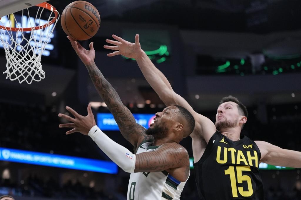 公鹿123:100擊敗爵士。(美聯社)