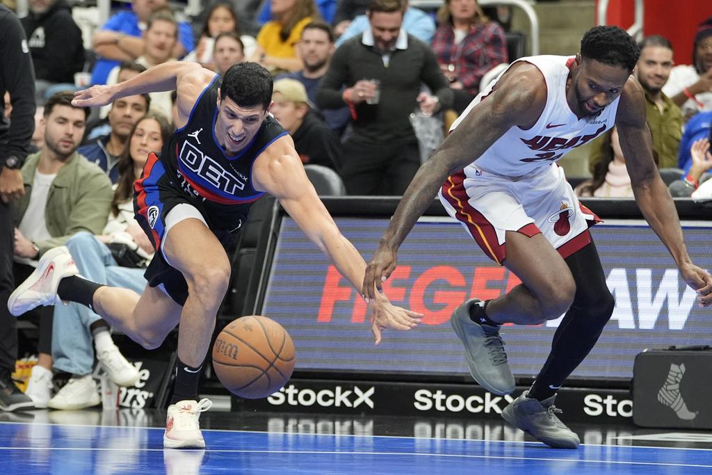 季中錦標賽,活塞在加時123:121擊敗熱火。(美聯社)