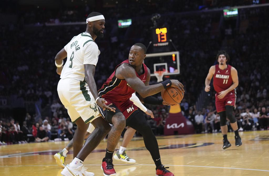 公鹿106:103擊敗熱火。(美聯社)