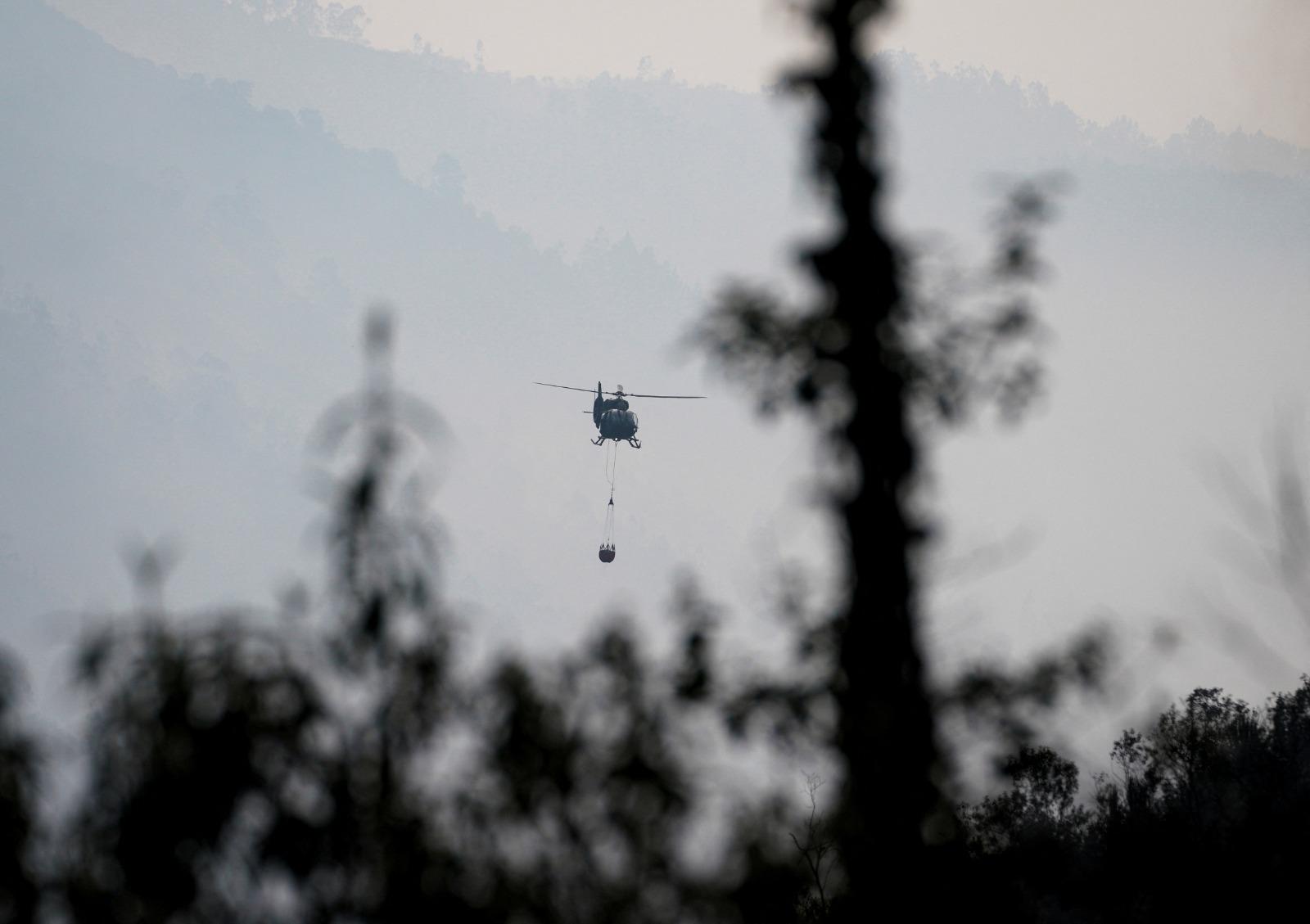 厄瓜多爾山火,過去幾周燒毀約1萬200公頃的森林土地。(路透社)