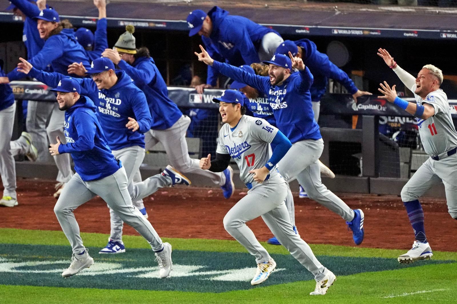 大谷翔平首嘗世界大賽冠軍滋味。(路透社)